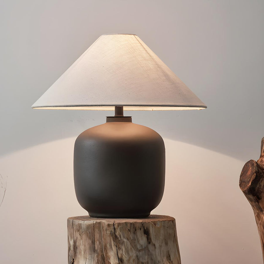 Ceramic base table lamp with white fabric shade representing Homebaa lamps collection