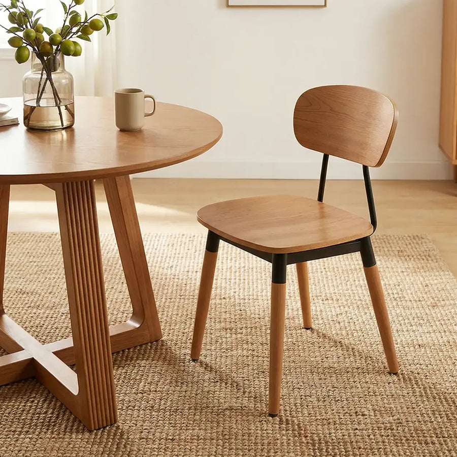 Modern curved open back armless dining chair for a small dining room
