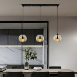 Modern Dining Room Clear Smoky Glass Globe Pendant Light Image - 5