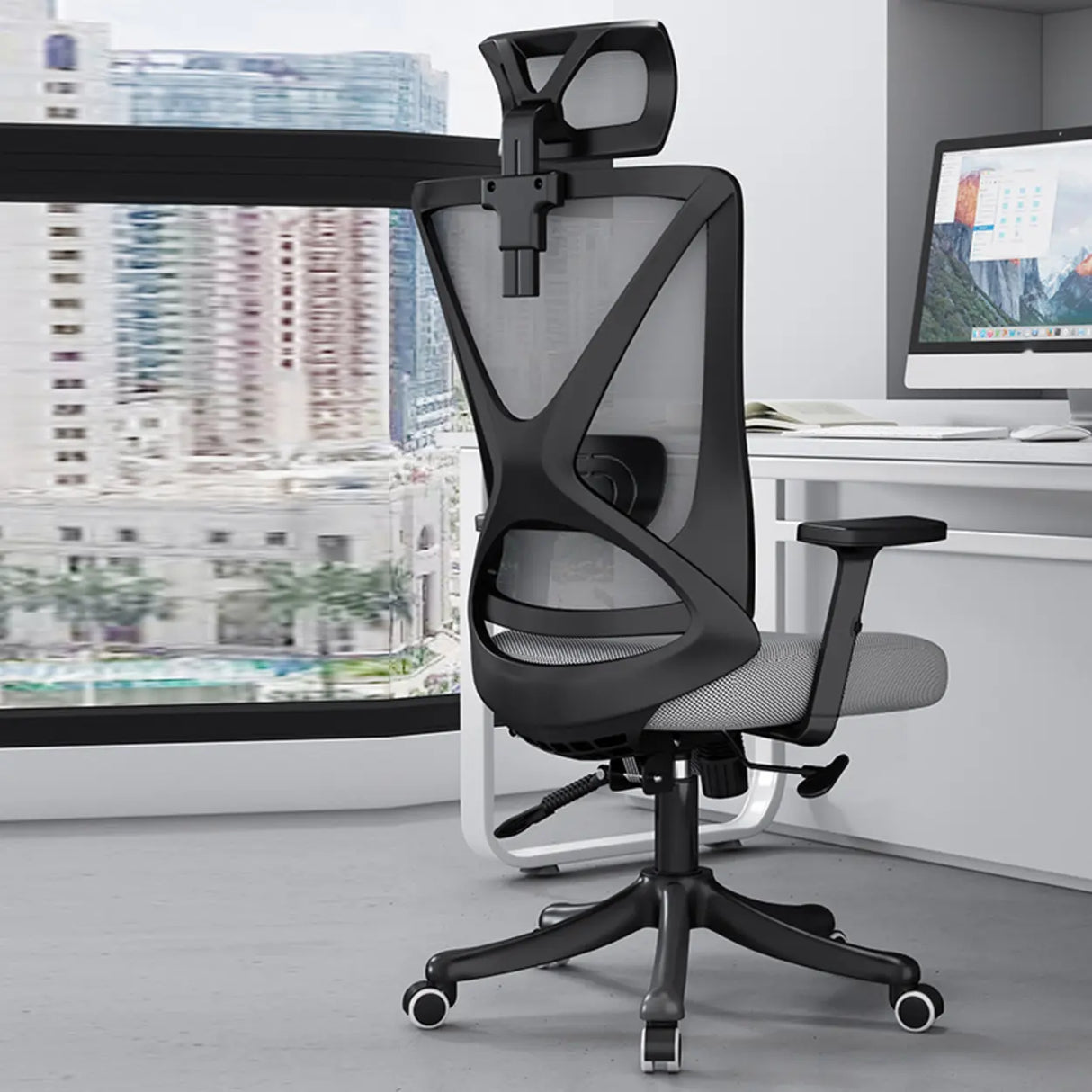 Modern Ergonomic Black Mesh Office Chair with Headrest Image - 4