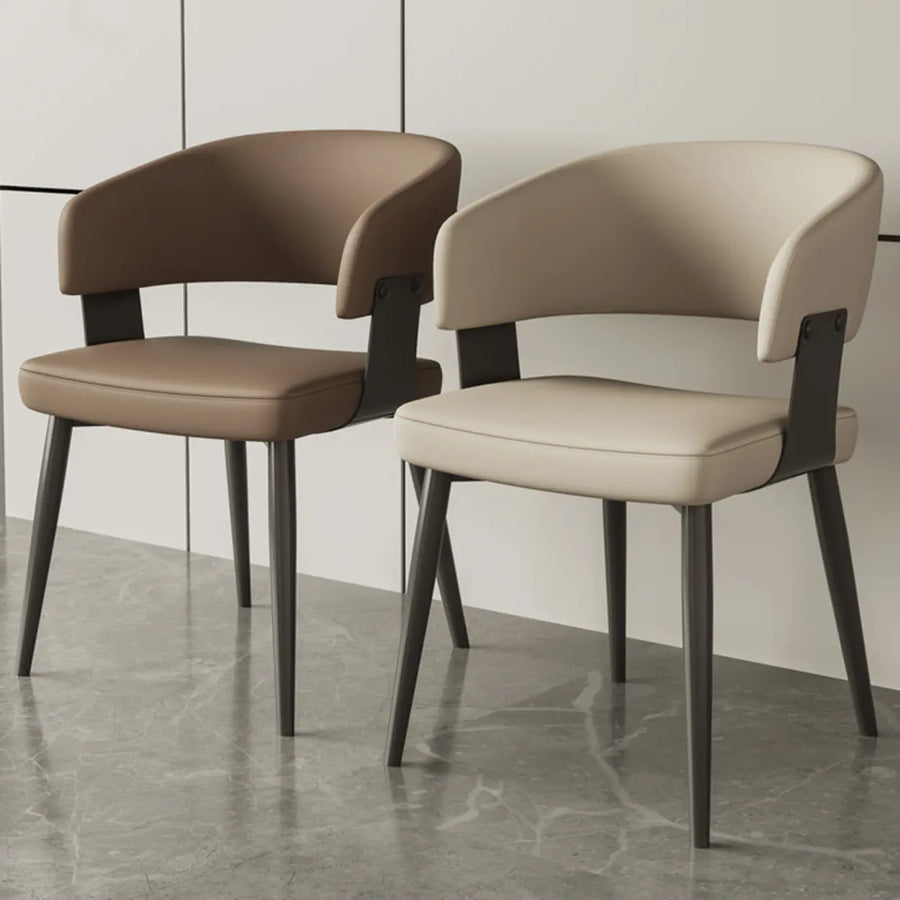 Neutral low-back leather dining chairs with slim metal legs