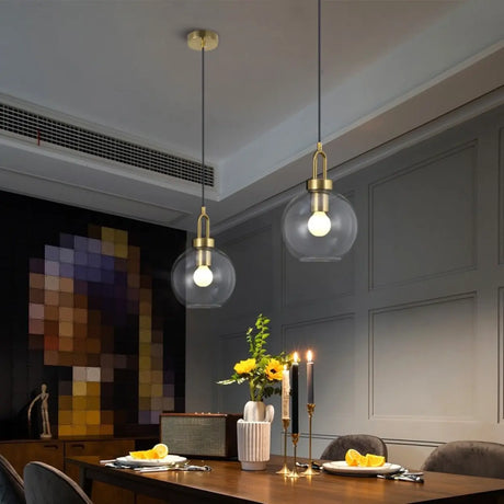 Modern Minimalist Ball Clear Glass Brass Pendant Light Image - 1
