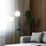 Modern Minimalist Glass Globe Circular Foot Switch Floor Lamp Image - 3