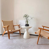 Modern Minimalist Sculpted Round White Pedestal Side Table Image - 3