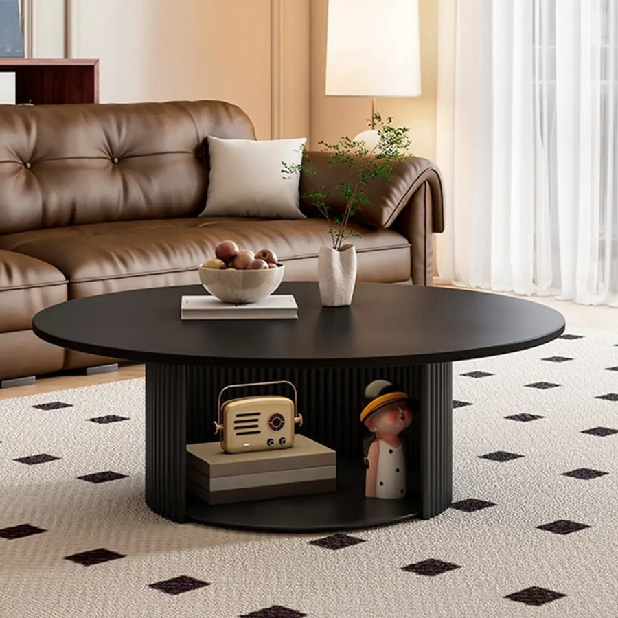Round black stone nesting coffee tables with storage for a modern living room