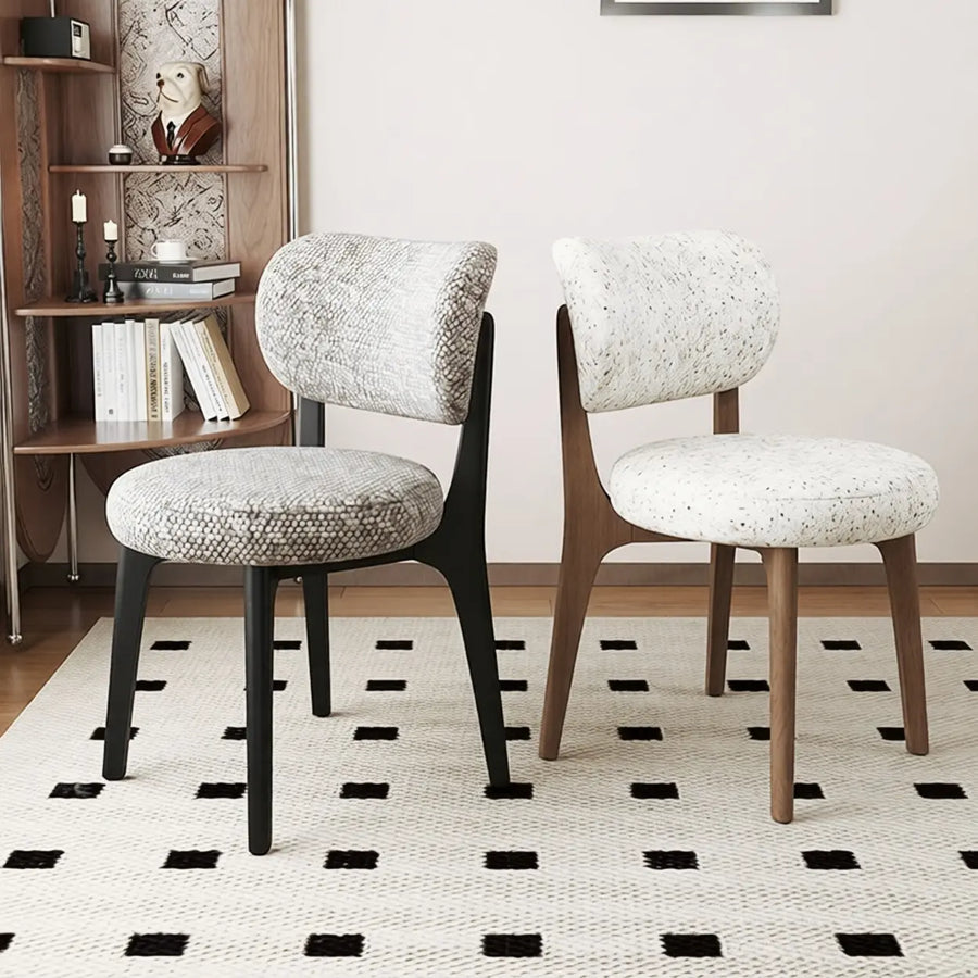 Compact modern upholstered curved-back armless wood dining chairs