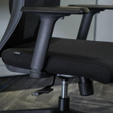 Modish Black Adjustable Fixed Arms Ergonomic Office Chair Image - 10