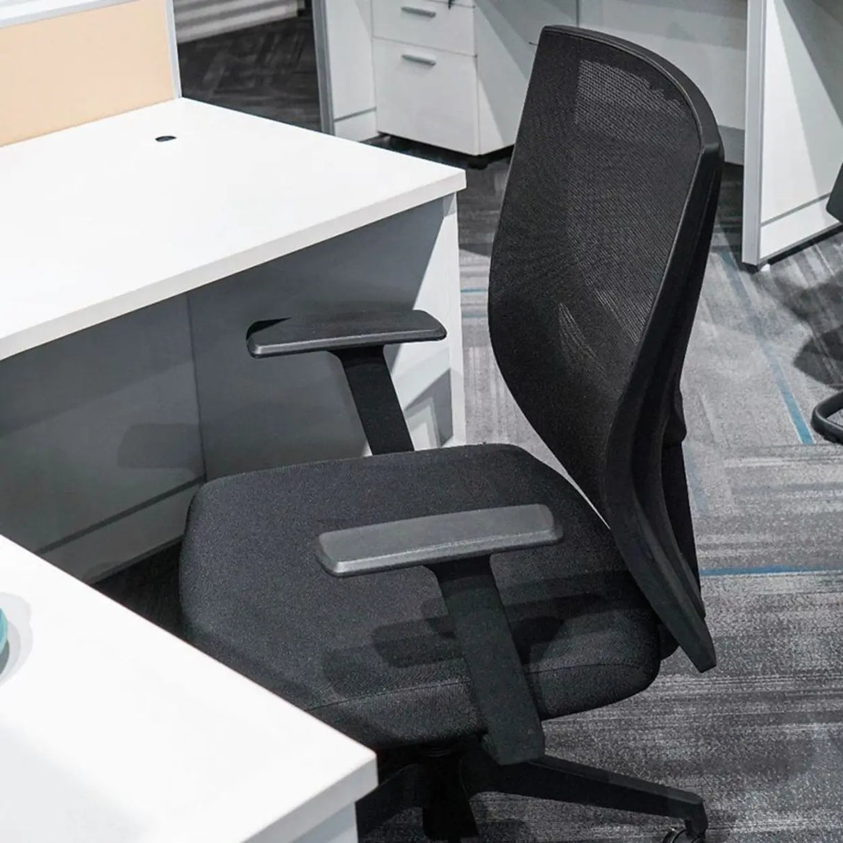 Modish Black Adjustable Fixed Arms Ergonomic Office Chair Image - 12