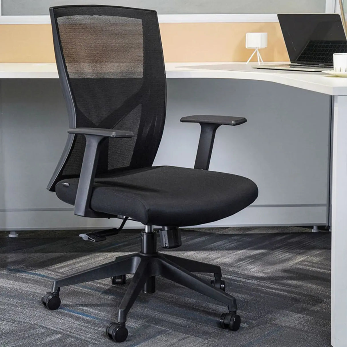 Modish Black Adjustable Fixed Arms Ergonomic Office Chair Image - 3