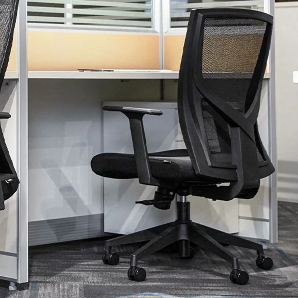 Modish Black Adjustable Fixed Arms Ergonomic Office Chair Image - 6