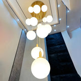Nordic Stairwell Cluster White Glass Globe Pendant Light Image - 6