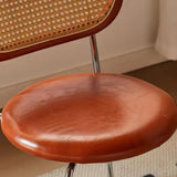 Oval Rattan Back Round Leather Stackable Dining Chair Image - 20