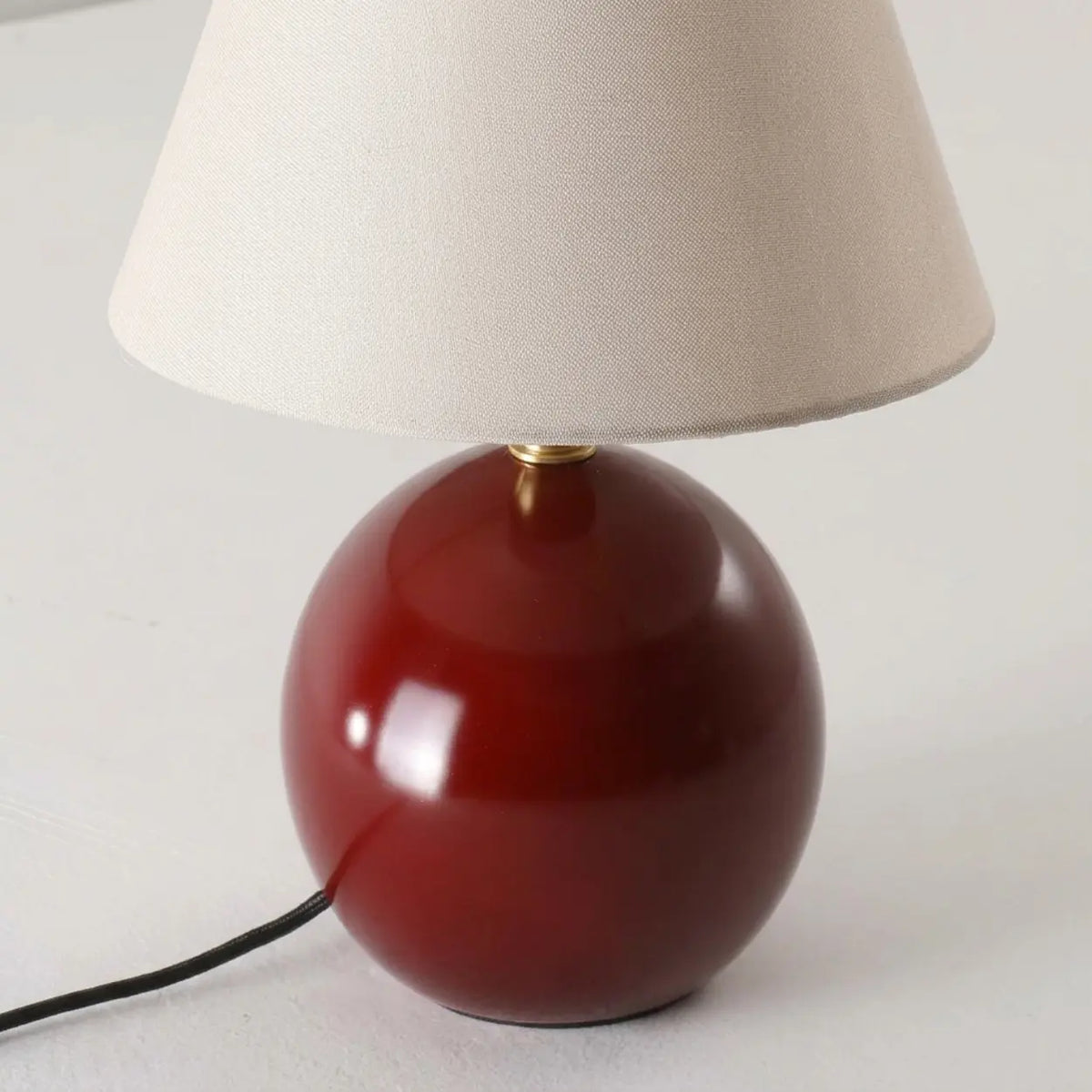 Red Ceramic Table Lamp with Beige Fabric Drum Shade Image - 6
