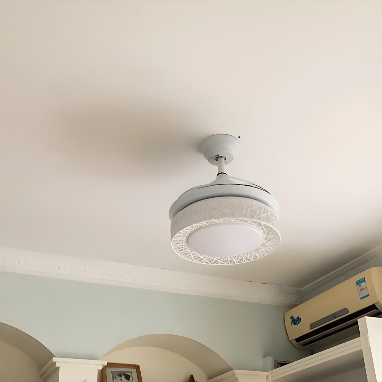 Retractable Blade White Round Ceiling Fan with Light Image - 10