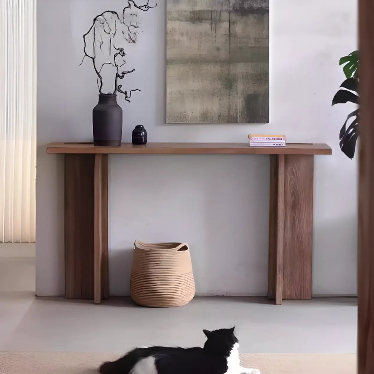 Natural wood narrow console table with double pedestal base for entryway styling