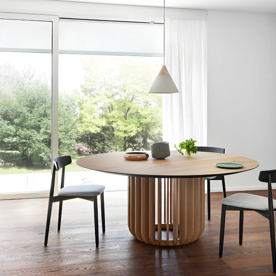 Dining table paired with comfortable upholstered dining chairs