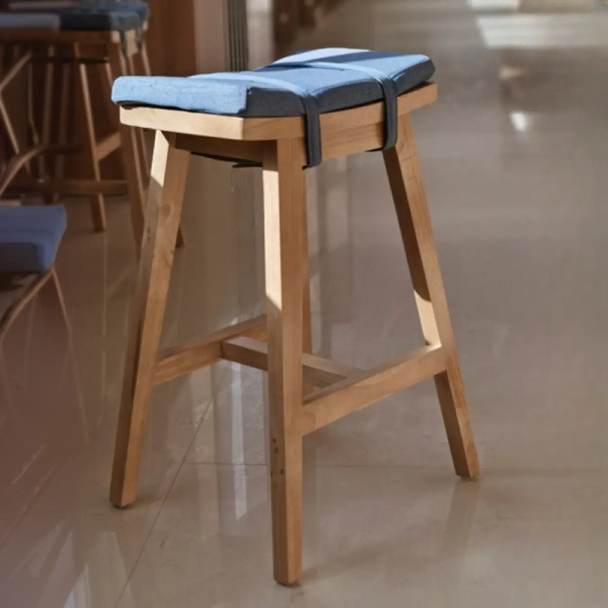 Saddle Wood Backless Short Bar Stool with Footrest Image - 4