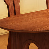 Scandinavian Arch Leg Brown Wood Oval Peninsula Dining Table Image - 4