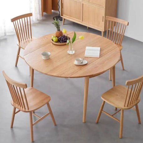 Scandinavian Extendable Round Natural Wood Dining Table Image - 1