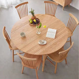 Scandinavian Extendable Round Natural Wood Dining Table Image - 5