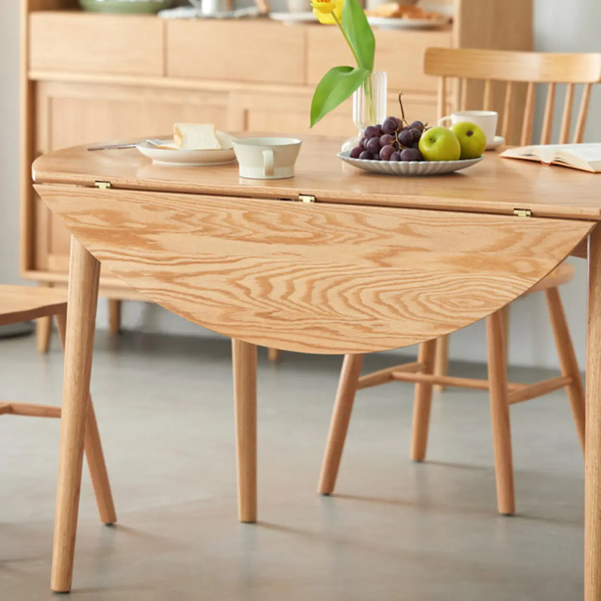 Scandinavian Extendable Round Natural Wood Dining Table Image - 6