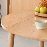 Scandinavian Extendable Round Natural Wood Dining Table Image - 8