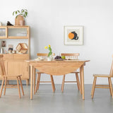 Scandinavian Extendable Round Natural Wood Dining Table Image - 9