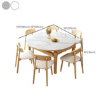 Scandinavian Round Stone Dining Table Self-Storing Leaf Image - 11