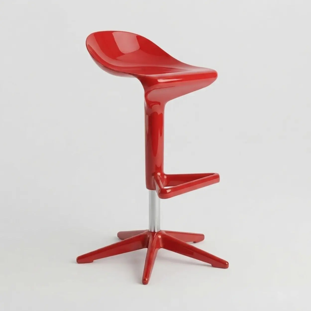 Red molded PP swivel bar stool with adjustable height, integrated footrest, chrome support column and five-point base on a white background