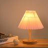 Simple Natural Wood Base White Pleated Shade Table Lamp Image - 4