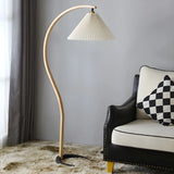 Simple Red Pleated Shade Curved Wooden Floor Lamp Image - 7