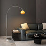 Sleek Adjustable Amber Glass Globe Arched Floor Lamp Image - 1