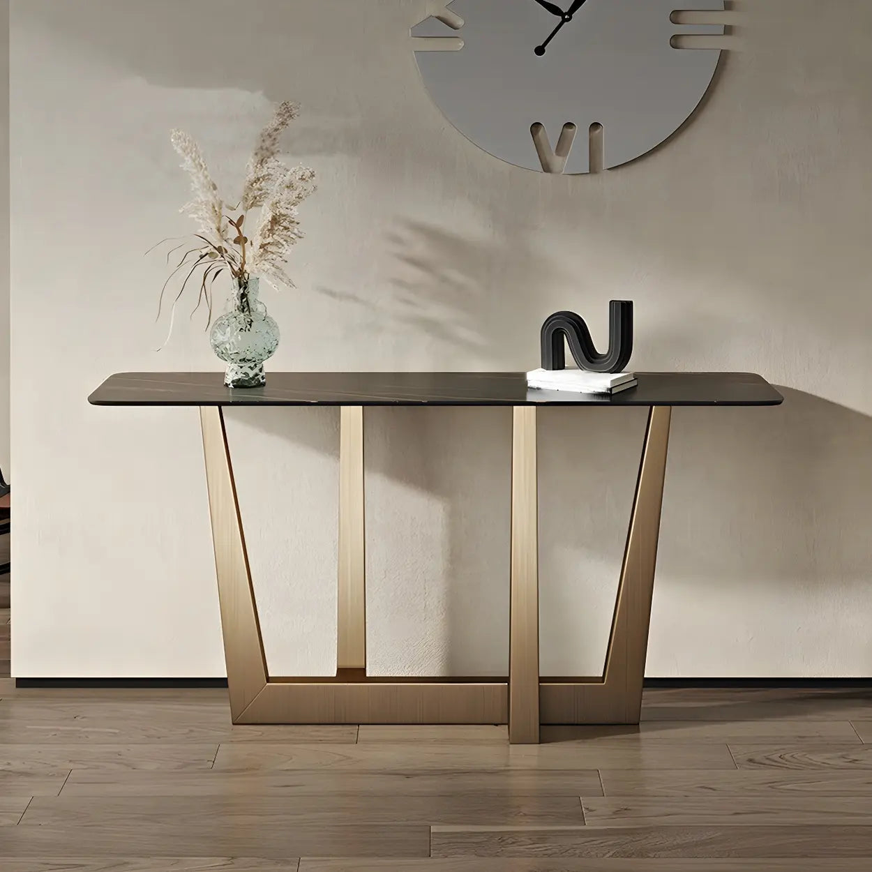 Sleek Black Stone Top Gold Abstract Frame Console Table