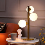 Stylish Gold 3-Light Globe Shade Metal Table Lamp Image - 1
