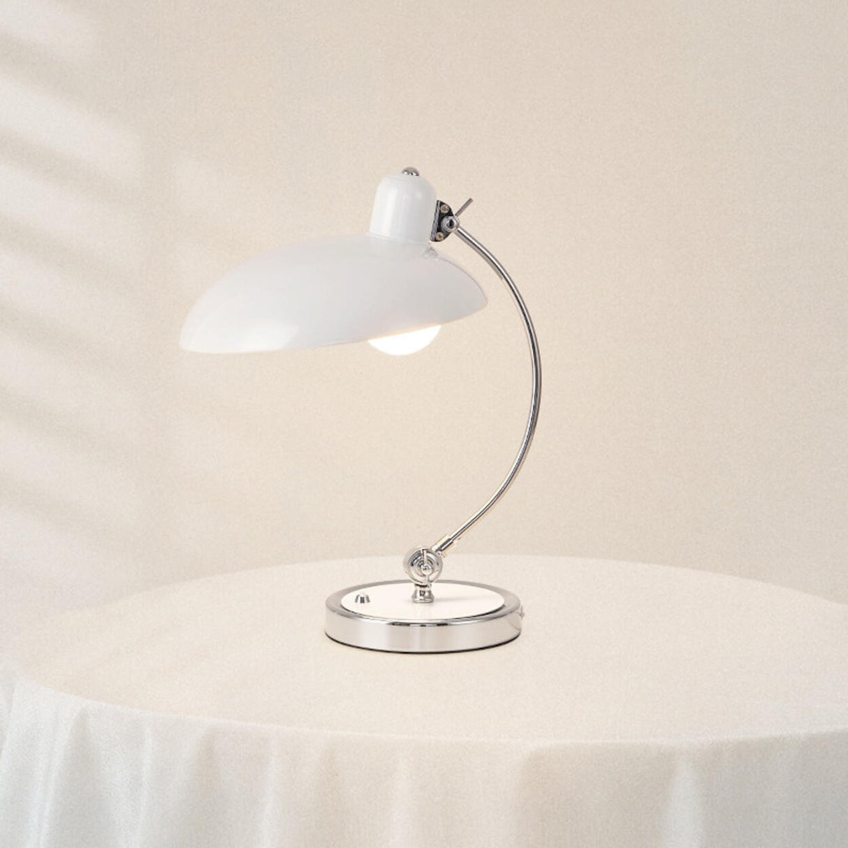 Stylish Silver Metal Curved Arm Bowl-Shaped Table Lamp Image - 1