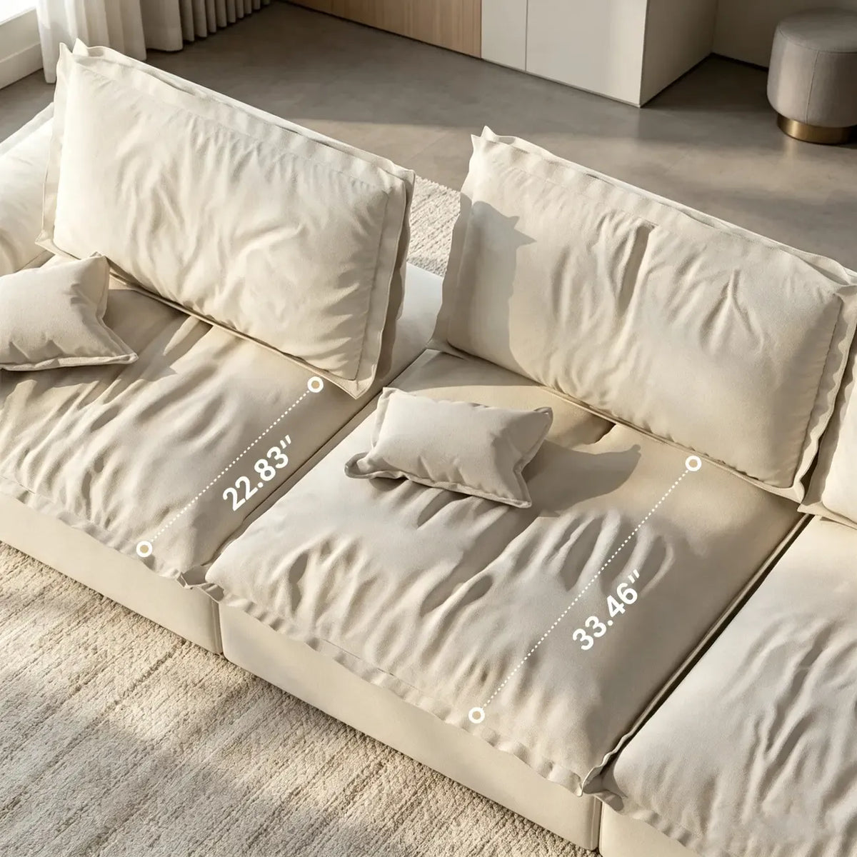 Beige suede modular sofa with adjustable backrests showing seat depths of 22.83 and 33.46 inches