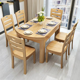 Traditional Round Wood Storing Leaf Extendable Dining Table Image - 5